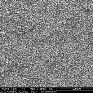 HDY micron powder at 500x, whole particle size distribution, 200 micron scale bar