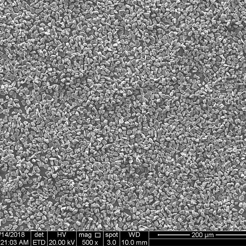 HDY micron powder at 500x, whole particle size distribution, 200 micron scale bar