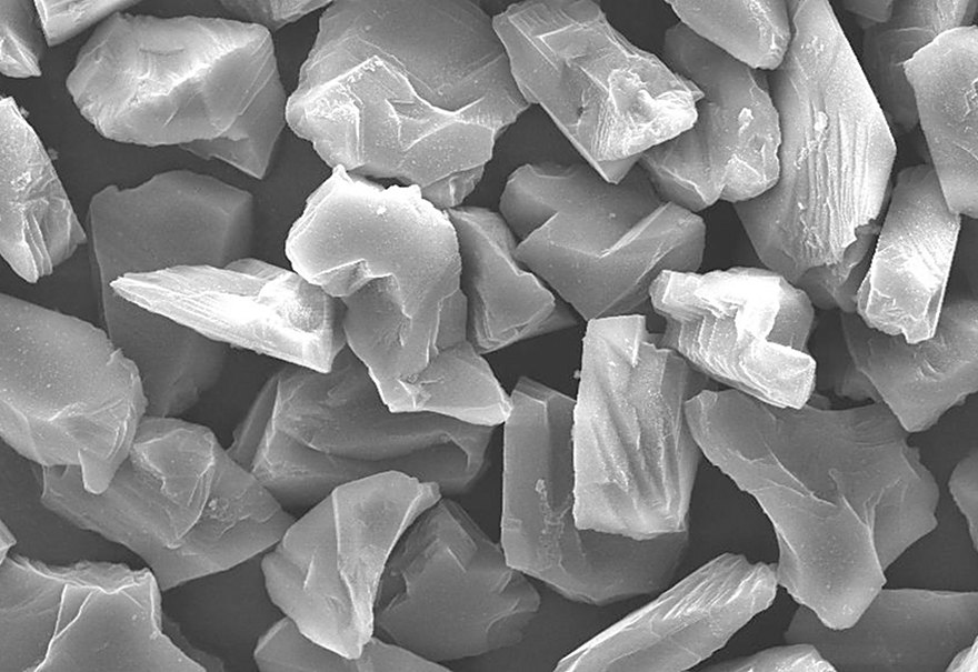 Micron diamond powder crystals under the microscope